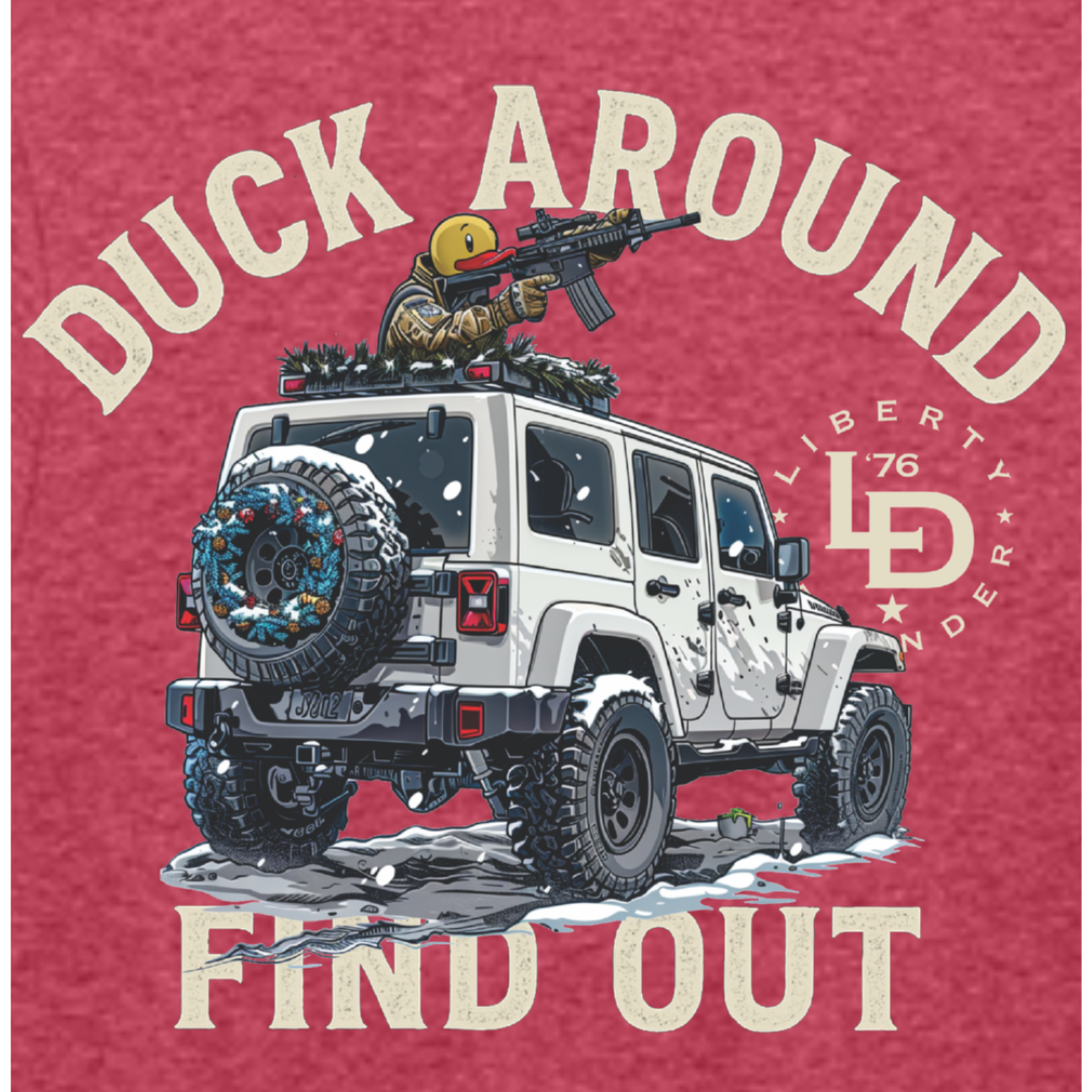 Patriotic Duck Around Find Out graphic featuring a winter trail vehicle with a defender on top, printed on red heather fabric.
