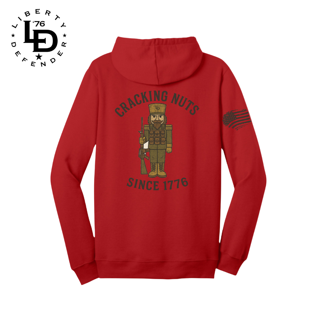 Red hoodie with nutcracker design and text on a white background
